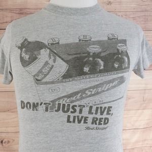 VTG RED STRIPE BEER BREWED IN JAMAICA DON'T JUST LIVE, LIVE RED PROMO T-SHIRT S